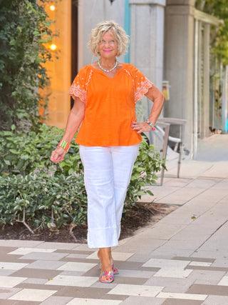 ORANGE FLORAL EMBOIDERY TOP Cathys Place