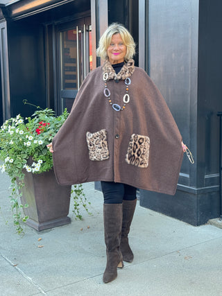 Whisper of the Wild: The Leopard Pocket Winter Cape
