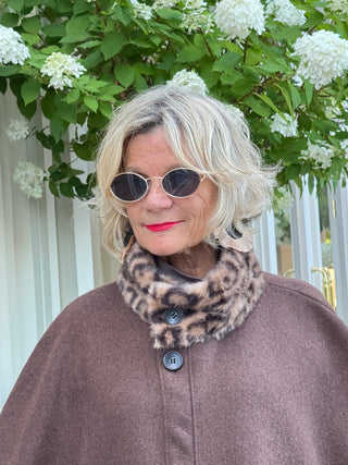 Whisper of the Wild: The Leopard Pocket Winter Cape