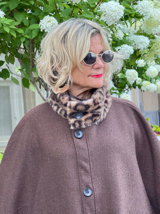 Whisper of the Wild: The Leopard Pocket Winter Cape