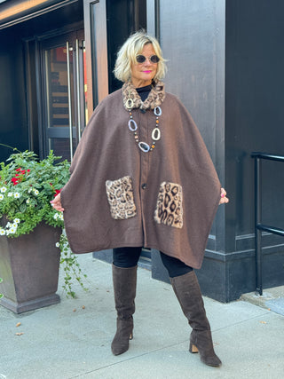 Whisper of the Wild: The Leopard Pocket Winter Cape